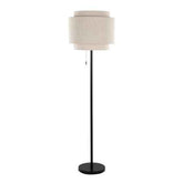 Floor lamp with a beige shade and black base on a white background