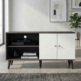 Contemporary black and white wood TV stand with open shelves, cabinet doors, and angled legs, suitable for TVs up to 47.3 inches