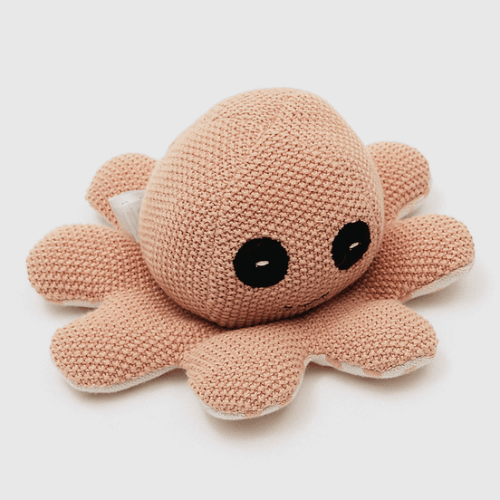 Peach-colored handmade octopus plush toy for infants, soft knitted stuffed animal