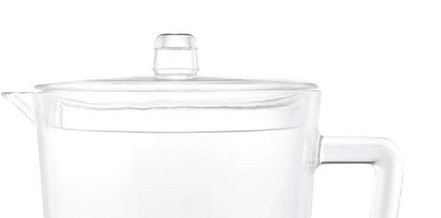Close-up of the BPA Free Drink Pitcher lid with easy-pour spout, highlighting its secure fit and transparent design for spill-free serving.