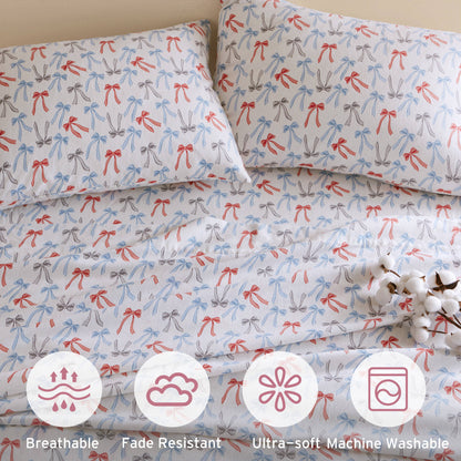 Happy Bows flannel bedding highlighting breathable, fade-resistant, ultra-soft, and machine washable features.