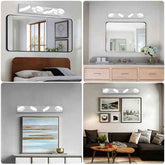 A four-panel collage showing a modern rectangular wall mirror with an integrated three-light vanity fixture above it, styled in different interior settings: a bedroom, a bathroom vanity, a console in a living room, and above a painting. The product being highlighted is the lighted mirror fixture, not the furniture or decor.
