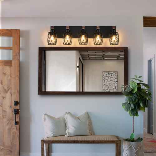Foyer with a mirror, bench, and decorative items on a light blue wall.
