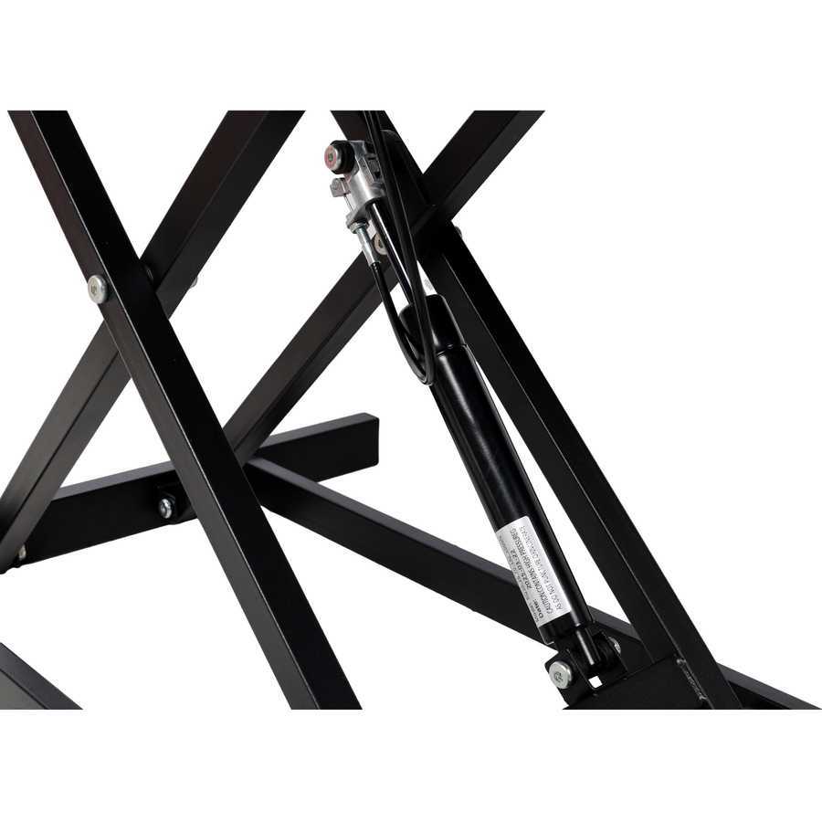 Close-up of gas spring lift mechanism on adjustable height laptop desk, ensuring easy and secure height adjustments.