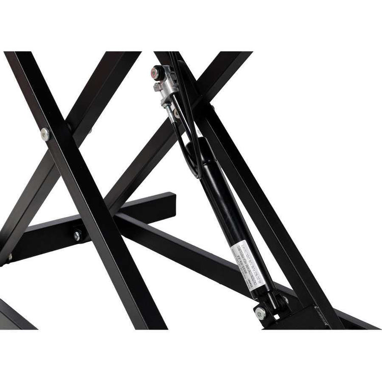 Close-up of gas spring lift mechanism on adjustable height laptop desk, ensuring easy and secure height adjustments.