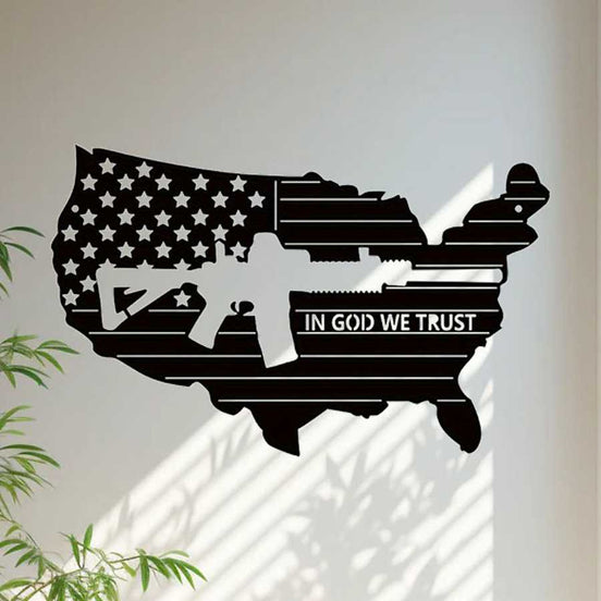 Patriotic American flag iron wall art in USA map shape with rifle and 'In God We Trust' text, perfect for man caves or patriotic home decor.