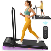 Black portable under desk treadmill with LED display, remote control, and purple accents, suitable for home office use