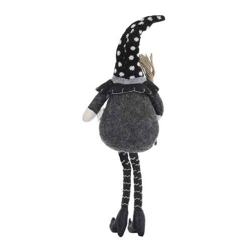 Back view of black gnome Halloween decor plush with polka dot hat, striped legs, and soft felt body, ideal for seasonal decorations