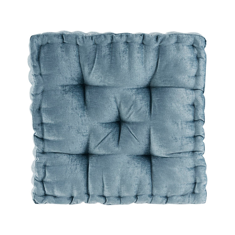 Blue textured cushion on a white background