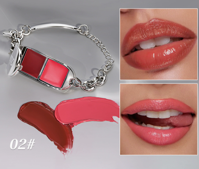 A silver chain bracelet holding a lipstick tube with two red shades, shown alongside two close-up lip swatches wearing the lipstick and two lipstick smears on a light gray background. Text reads &