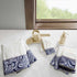 Jacquard bath towels with blue paisley pattern on white towels