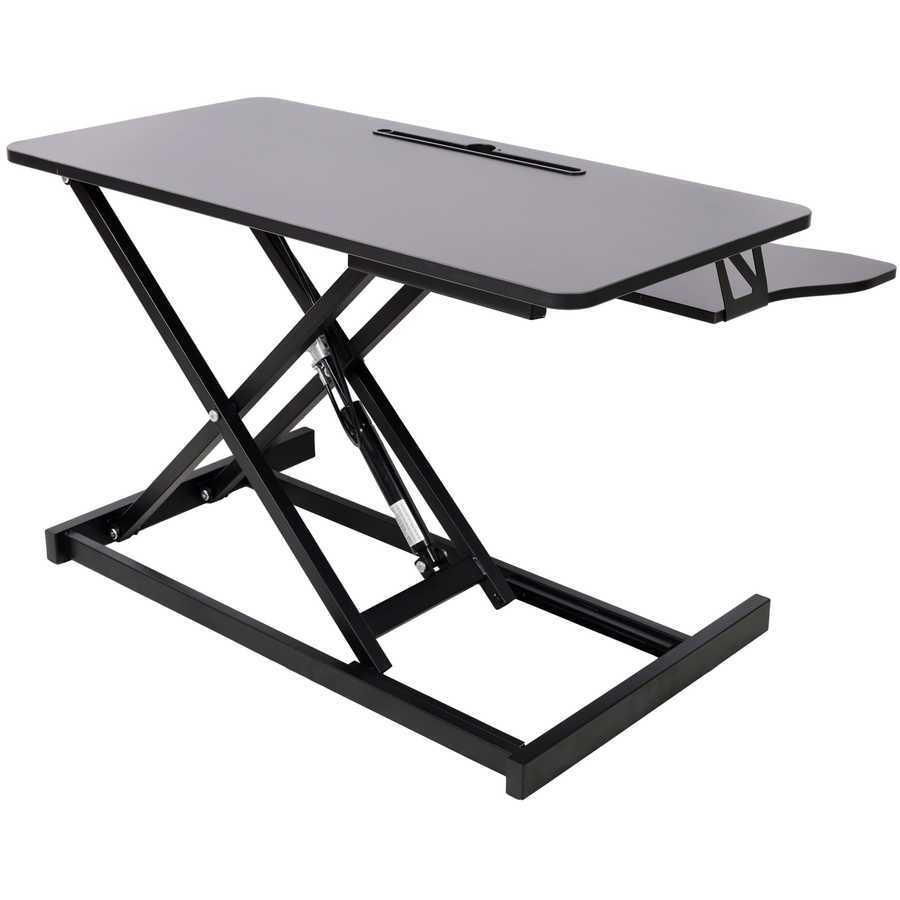Angled view of height adjustable laptop desk with keyboard tray extended, designed for flexible workstation configurations.
