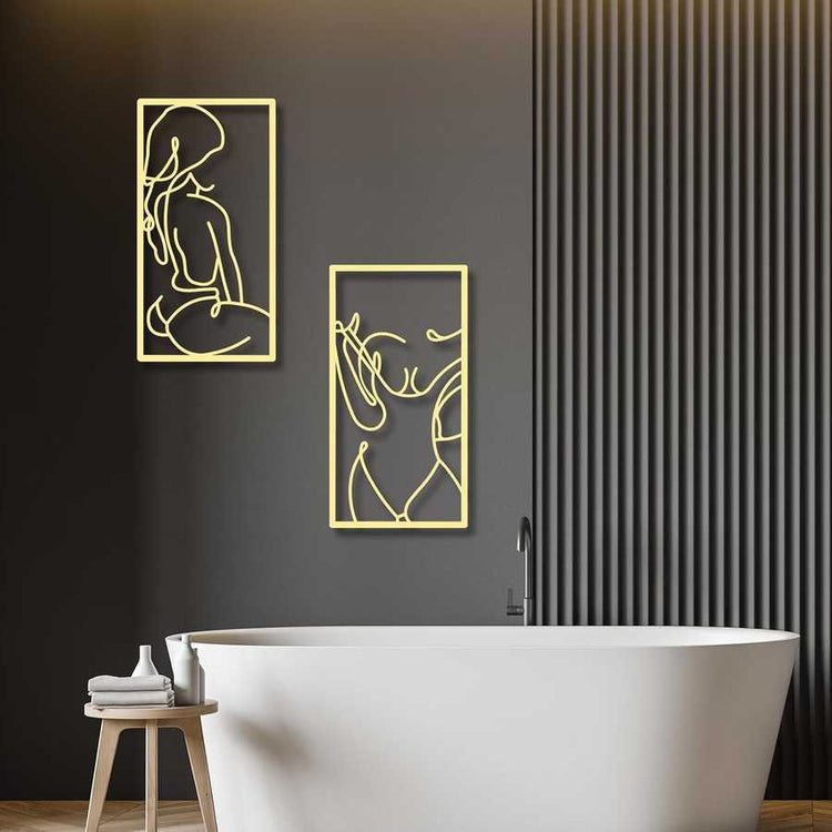 Bathroom interior with abstract art on a dark wall and a white bathtub.