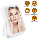 Beauty mirror with LED lights and magnification features on a white background