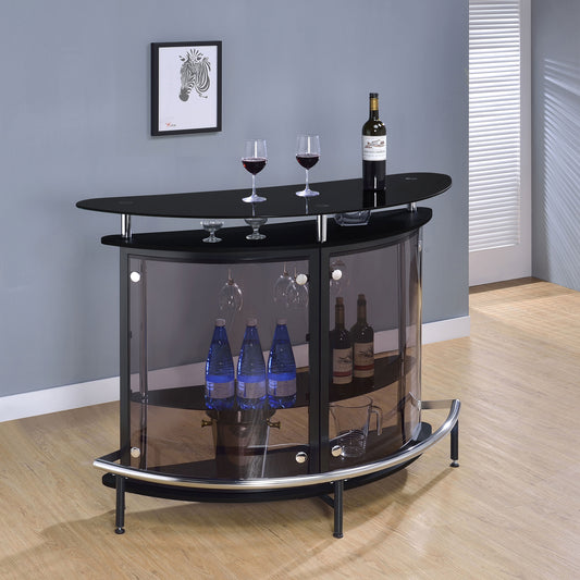 Black glass top home wine bar cabinet with curved design, wine storage shelves, and bottle display in a modern dining room setting.