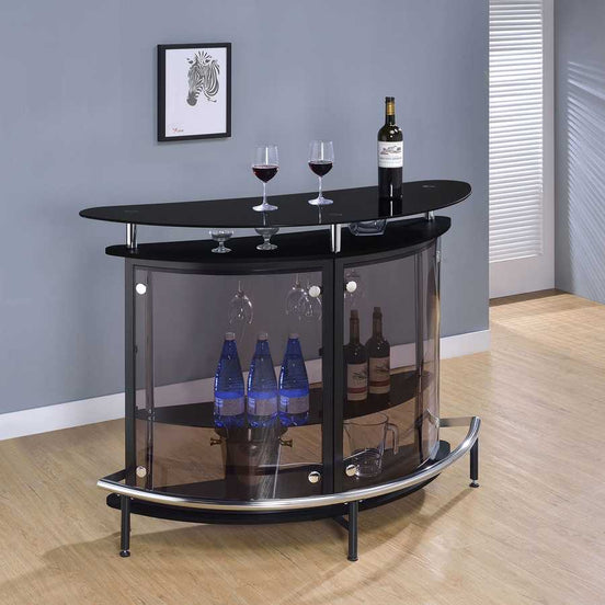 Black glass top home wine bar cabinet with curved design, wine storage shelves, and bottle display in a modern dining room setting.
