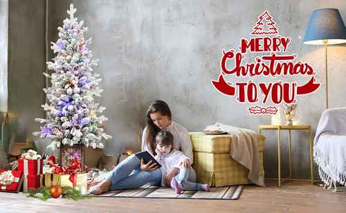Flocked Christmas tree with LED lights in a holiday family scene