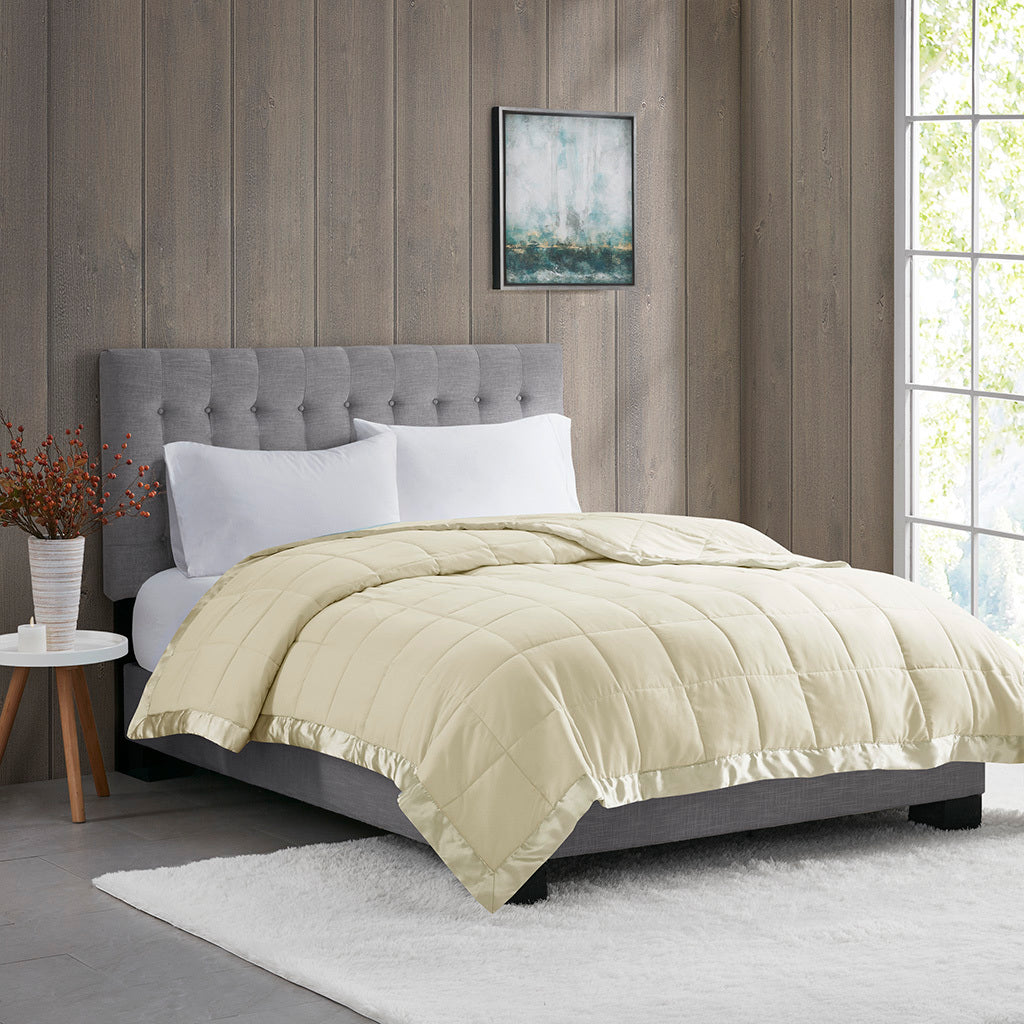 Down Alternative Blanket Twin Cream - Soft, Hypoallergenic with satin trim on a modern bed in a cozy bedroom setting. Ideal for year-round comfort.