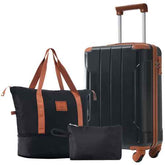 Black 20 inch carry on luggage with brown accents, telescoping handle, four wheels, and matching travel accessories for business trips