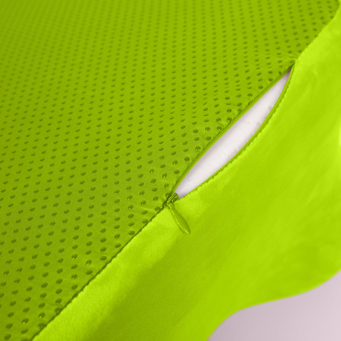Close-up of non-slip fabric and zipper on Ergonomic Spinal Posture Support Pillow - Memory Foam for secure and hygienic use.