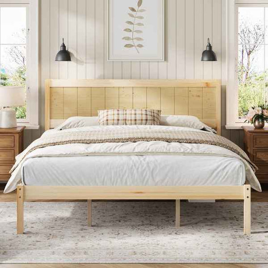 Wooden bed with bedding in a bedroom setting