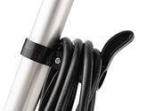 A close-up of a black cable loop or clip holding a coiled black cable around a silver metal pole, shown against a plain white background.