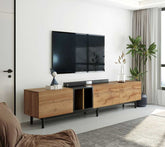 Stylish media console for 80 inch TV with natural wood texture and black legs, placed in a bright modern living room.