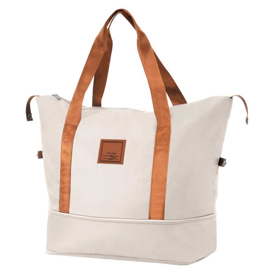 Beige tote bag with brown straps on a white background