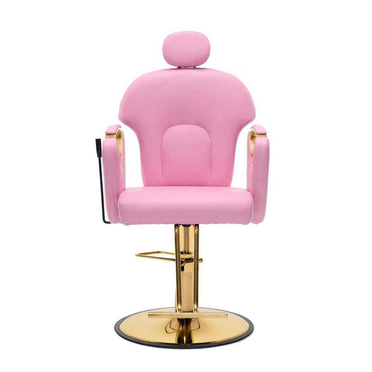 A pink salon barber chair with gold-finished metal hardware, featuring a rounded backrest, armrests, a headrest, and a circular swivel base on a white background.