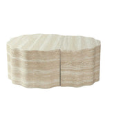 Side view of two beige marble round coffee tables with scalloped edges, perfect for living room or lounge area