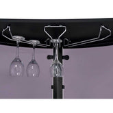 Close-up of under-shelf wine glass rack in black glass top home wine bar cabinet, holding stemware securely.
