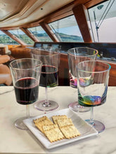 Set of 4 LeadingWare unbreakable wine glasses with red wine on a yacht, showcasing stylish and shatterproof drinkware for travel.