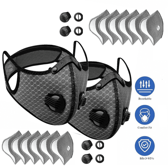 Two black face masks with filter cartridges on a white background