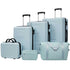 Set of light blue suitcases and travel bags on a white background
