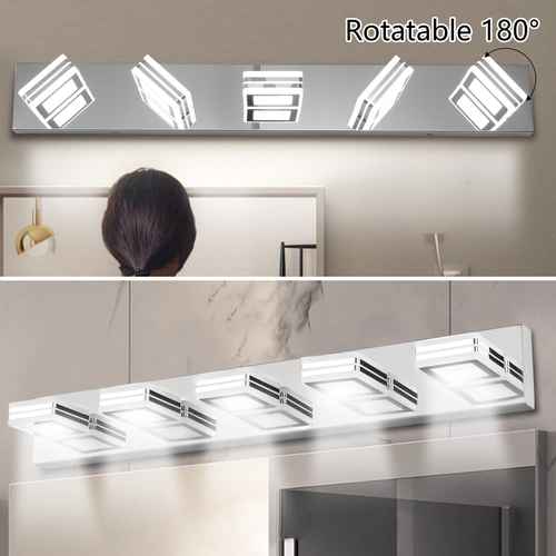 A five-light rectangular wall mirror light with rotating square-shaped LED reflectors, shown mounted above a mirror in a bathroom setting. A person&
