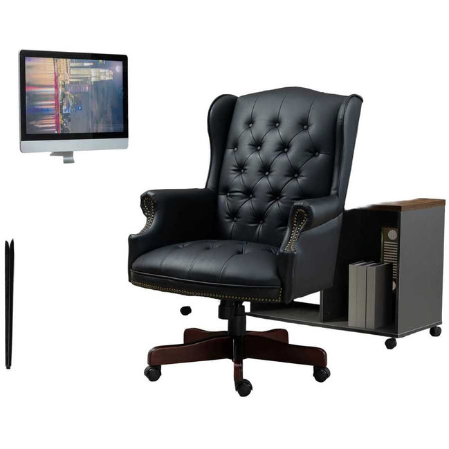 Black leather office chair in an office setting with a desk and computer monitor.