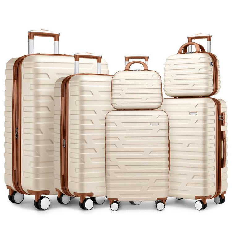 Set of beige suitcases with brown handles and wheels on a white background