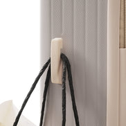 Close-up of side hook on durable ABS suitcase, ideal for hanging bags and enhancing travel functionality in a lightweight design.