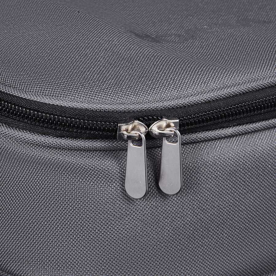 Grey picnic backpack with cooler, compact travel design, outdoor picnic setup, food storage