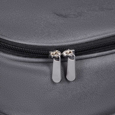 Grey picnic backpack with cooler, compact travel design, outdoor picnic setup, food storage