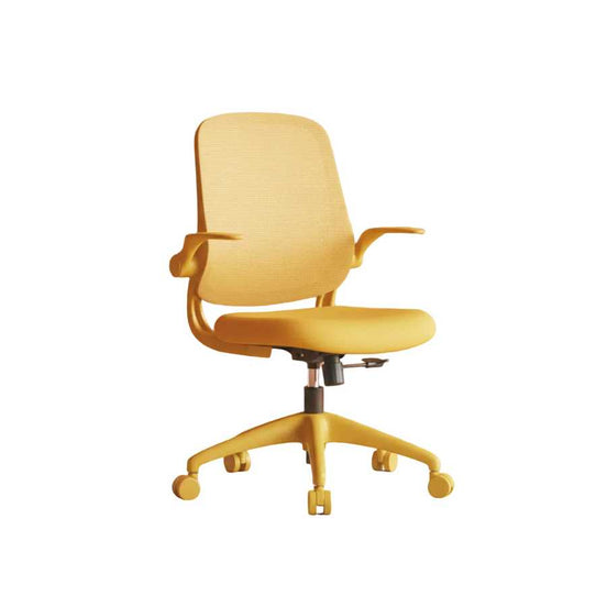 Yellow office chair in a modern office setting with a peach-colored wall.