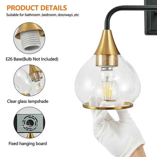 Product details graphic for a wall-mounted pendant light fixture. The main image shows a hand in a white glove holding a clear glass globe shade with a brass-toned top and bottom rings, with a black wall arm extending from the right.