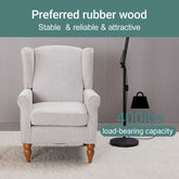 Gray armchair with wooden legs in a room setting, featuring text about rubber wood stability and load-bearing capacity.