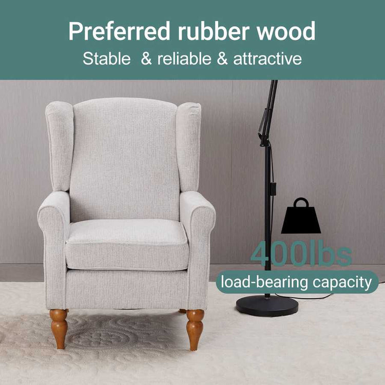 Gray armchair with wooden legs in a room setting, featuring text about rubber wood stability and load-bearing capacity.
