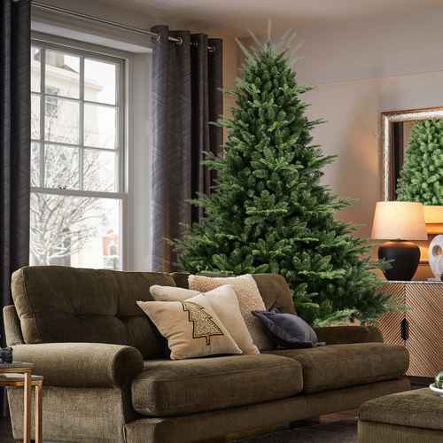 Full-shaped 4 ft Christmas tree in a living room