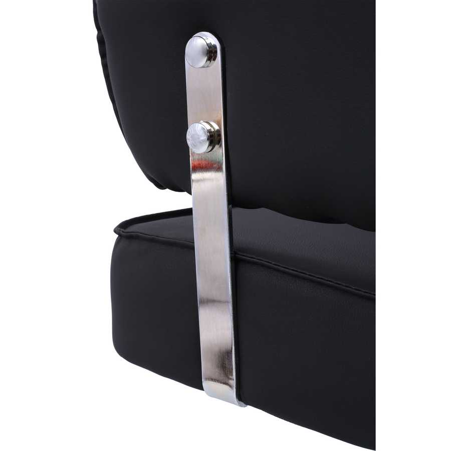 Close-up of Salon Styling Chair’s chrome support bracket connecting cushioned seat and backrest for enhanced durability.