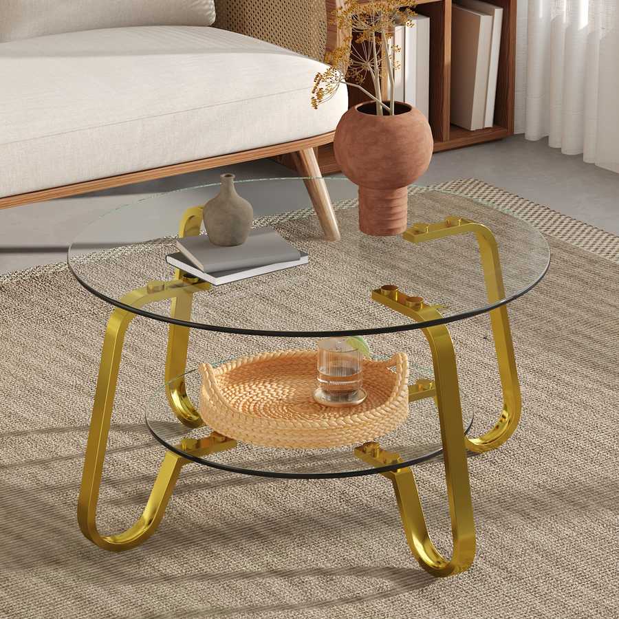 Vintage metal coffee table with round glass top and gold frame, styled in modern living room with neutral decor.