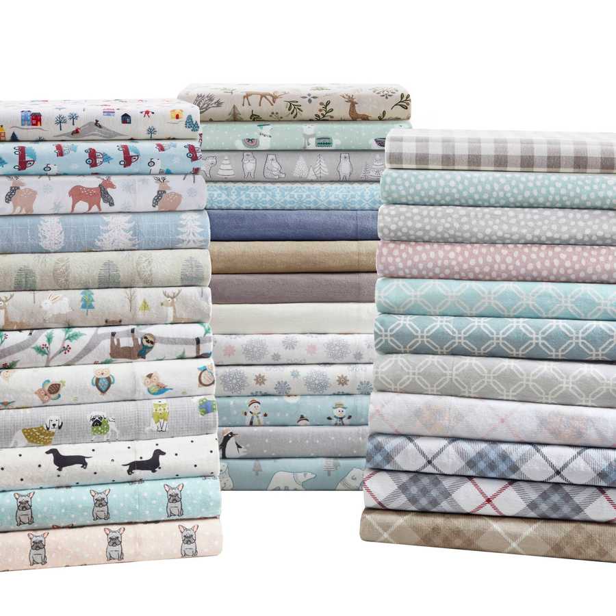 Variety of flannel sheet sets in different prints and colors, featuring the 3 PCS Twin XL Printed Sheet Set with White Village Print among them.