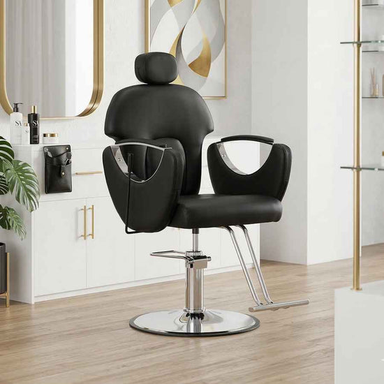 Black adjustable barber salon chair with cushioned headrest, armrests, and chrome base, ideal for hair stylist salons.