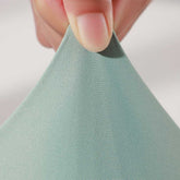 Stretch test of MLNshops MT20 Yoga Leggings fabric in green, demonstrating four-dimensional stretch for superior flexibility.